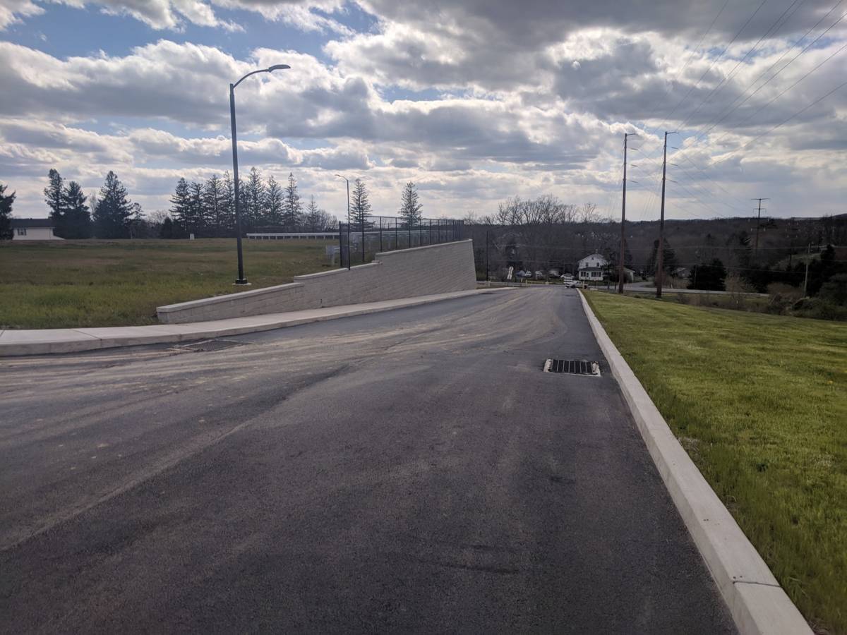 Retaining wall and paved roadway at Crestwood School