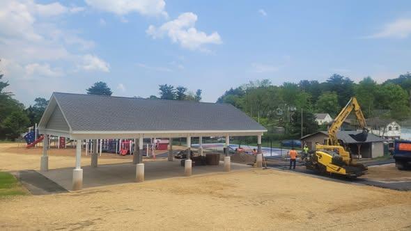 Pavilion and paving crew at Dallas Memorial Park