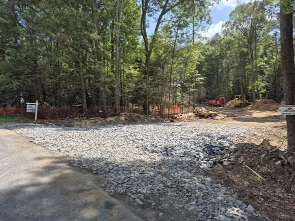 Cleared entrance and stone base at The Estate at Schollhammer's Farms